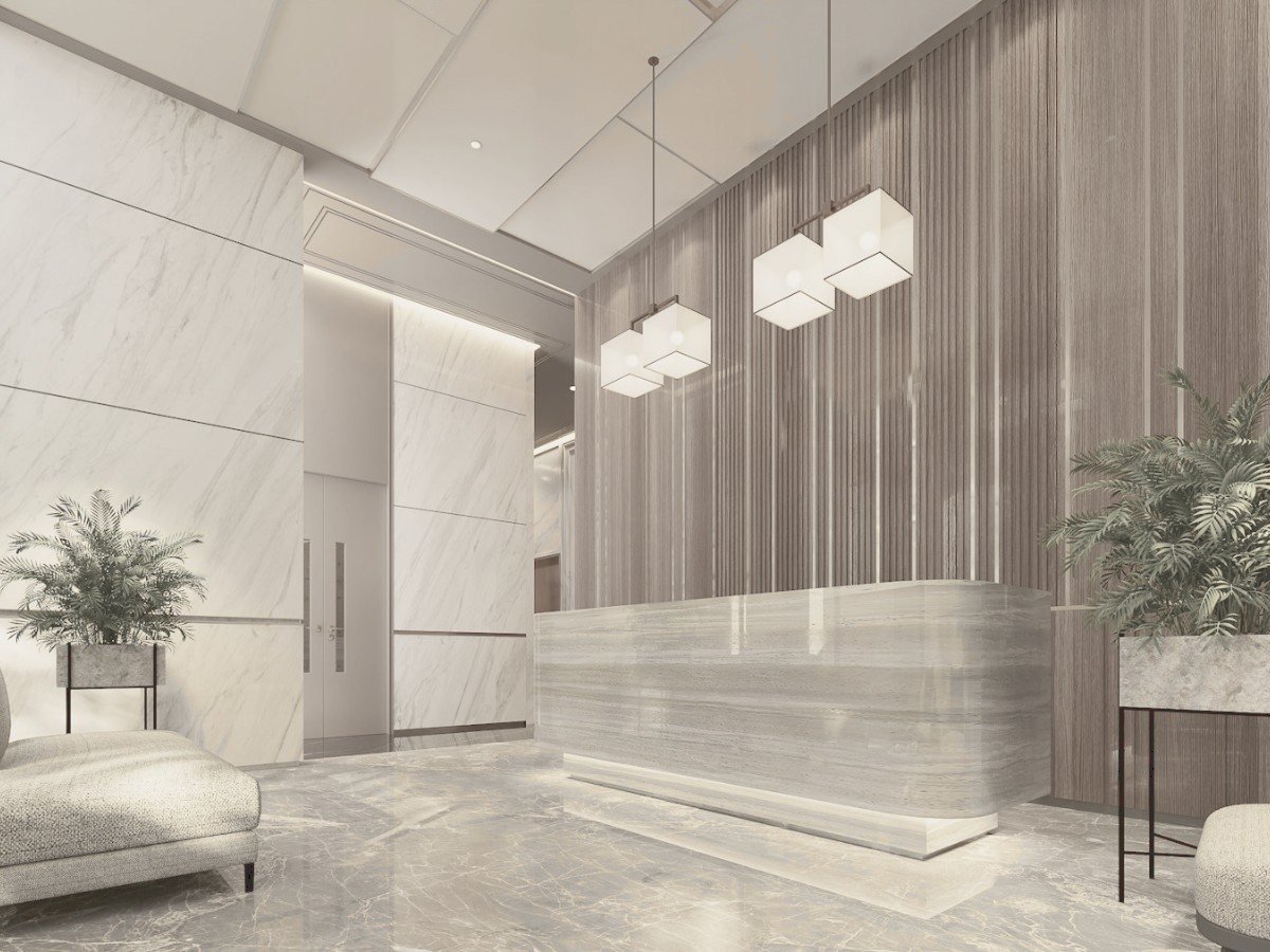 Arrival lobby with marble cladding, fluted timber and sculptural cube pendants