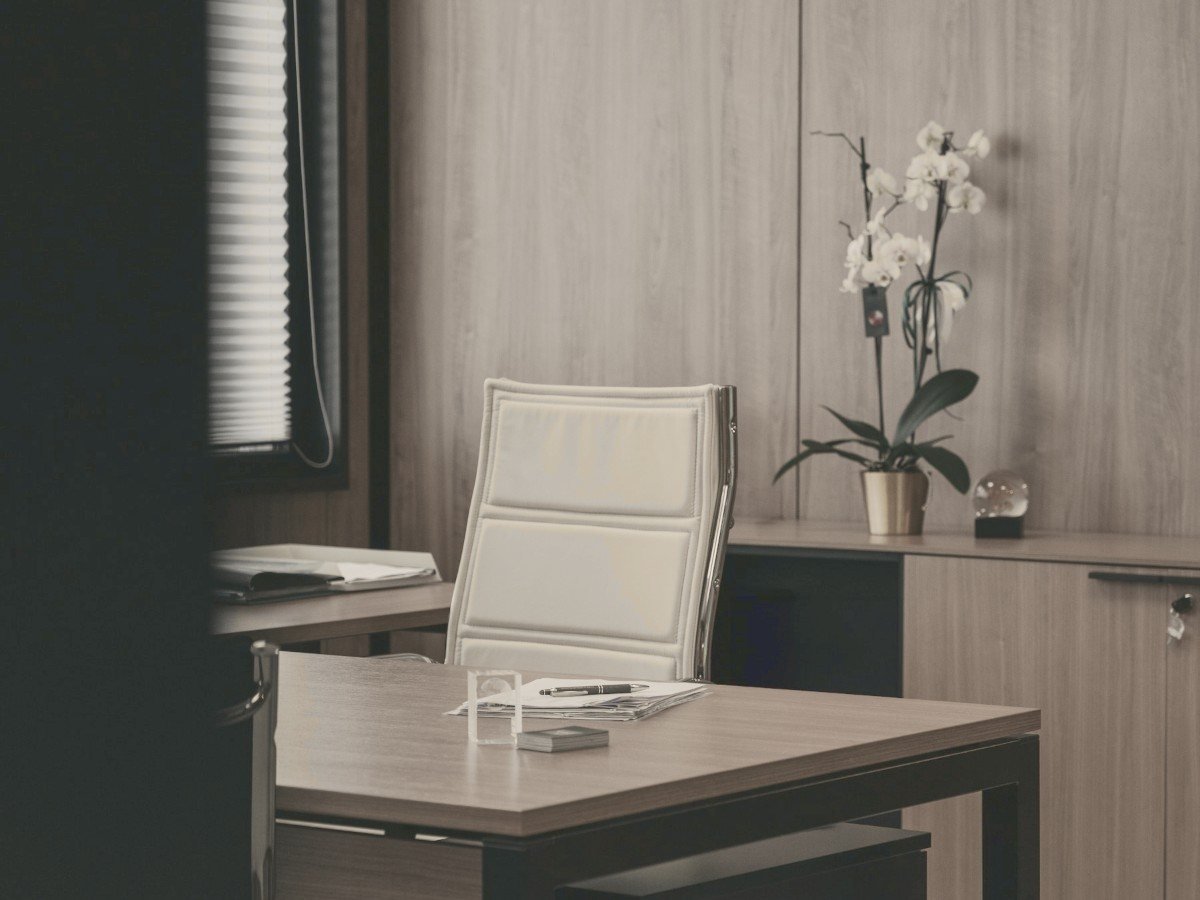 Executive cabin workspace with city skyline views