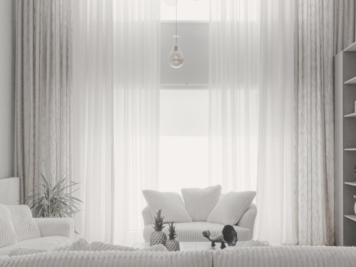 Living room with textured white sofa and fireplace