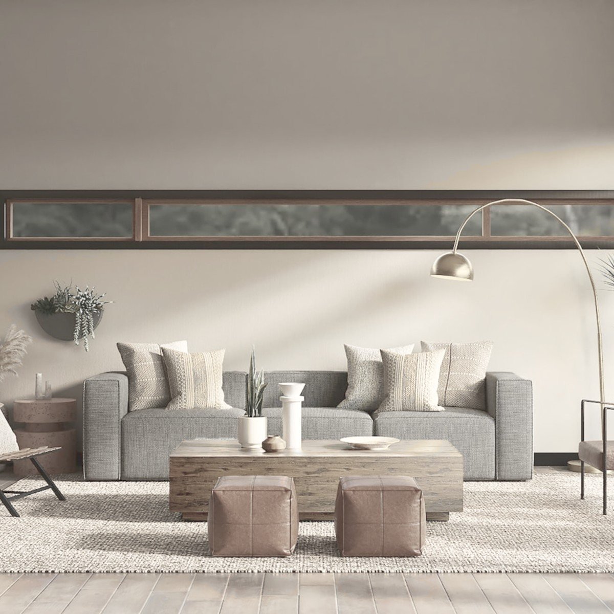 Residential living room with layered neutral upholstery and a clerestory window